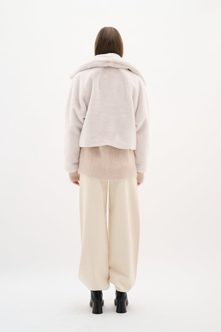 Manteau court en fausse fourrure Yobo