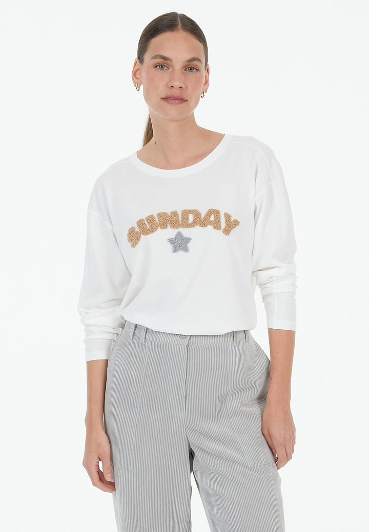 T-shirt à manches longues avec inscription en bouclé