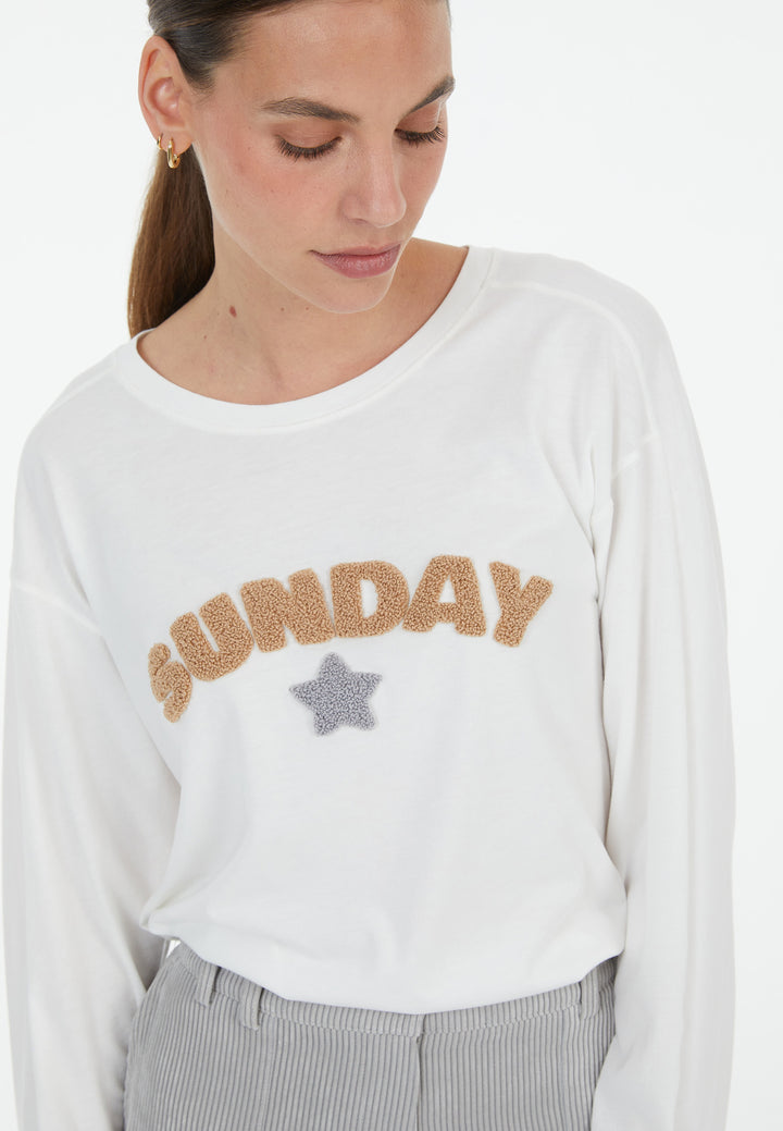 T-shirt à manches longues avec inscription en bouclé