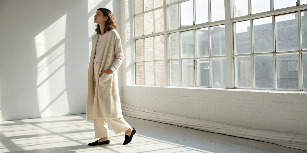 Woman wearing one of the best long cocoon cardigans.