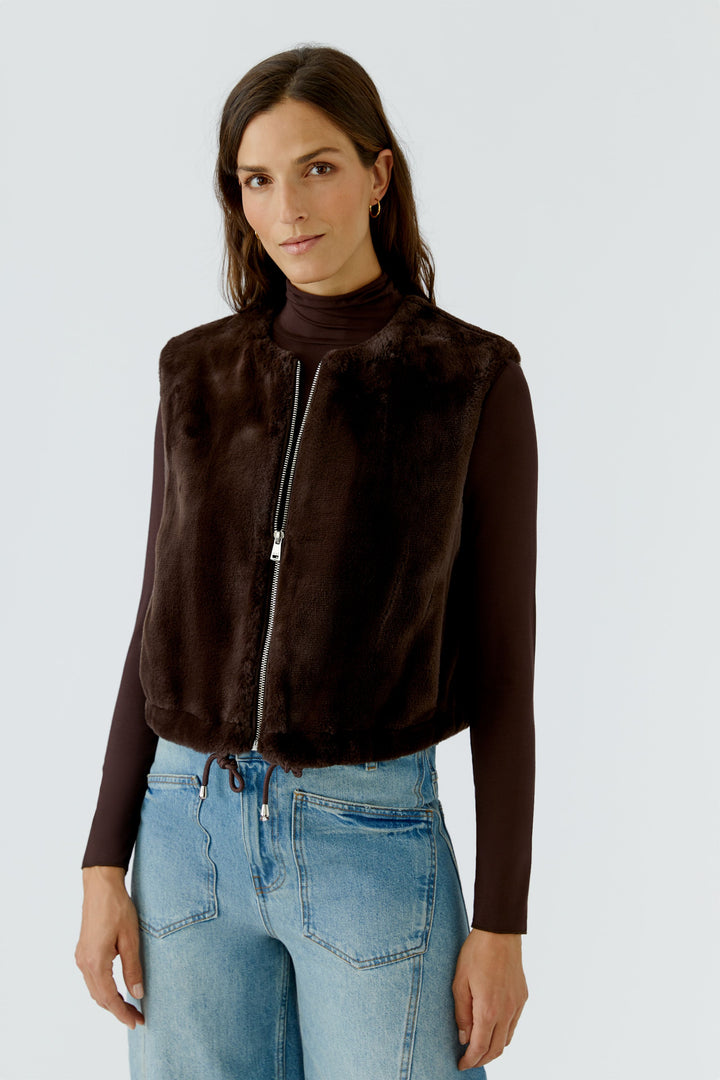 Veste sans manches duveteuse à glissière