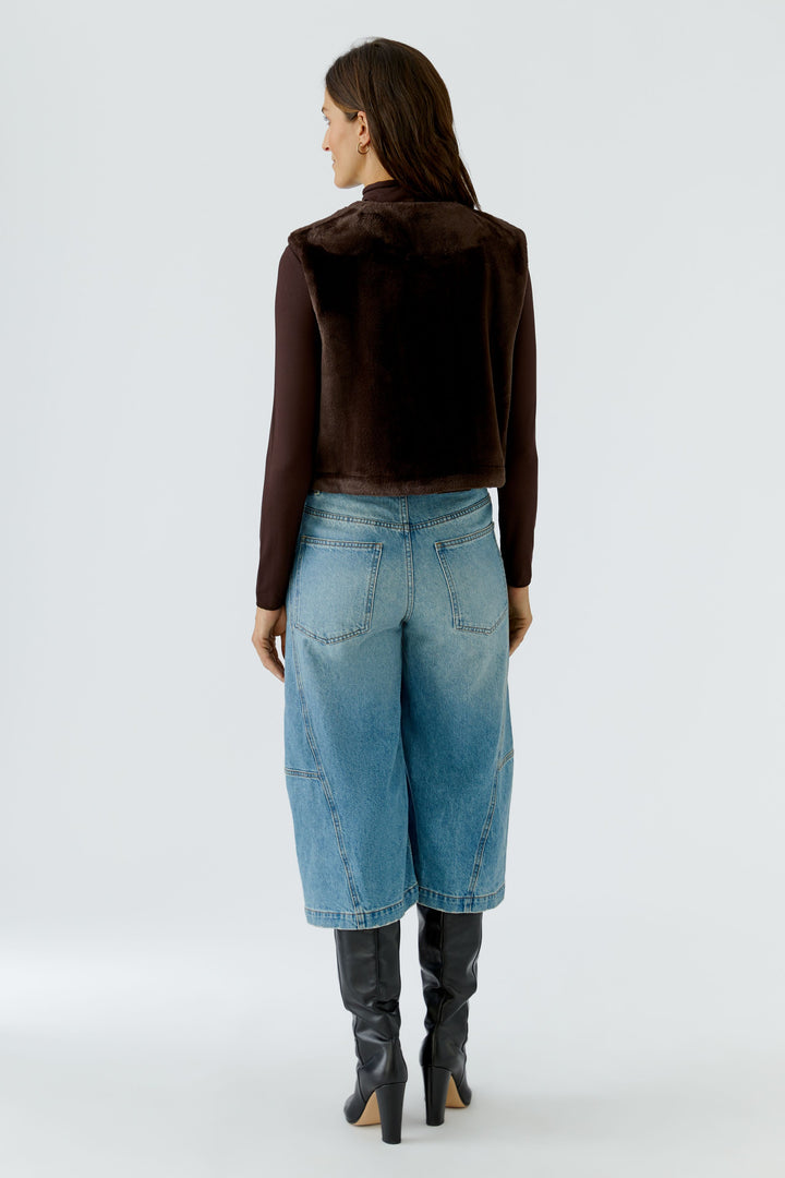 Veste sans manches duveteuse à glissière