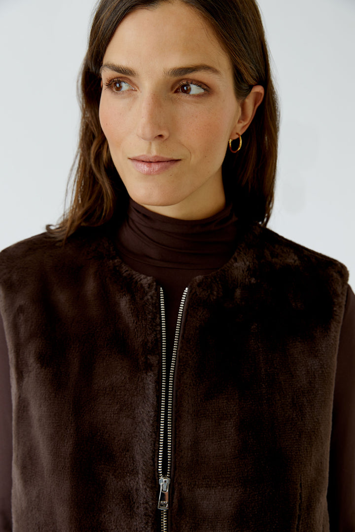 Veste sans manches duveteuse à glissière