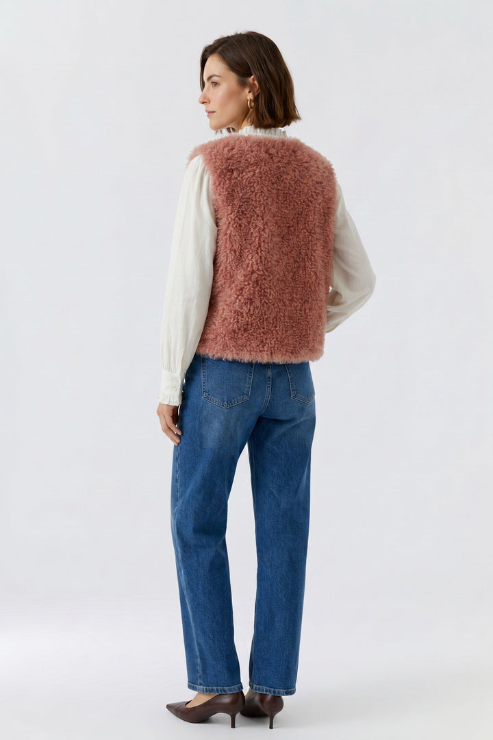 Veste courte sans manches à texture bouclée