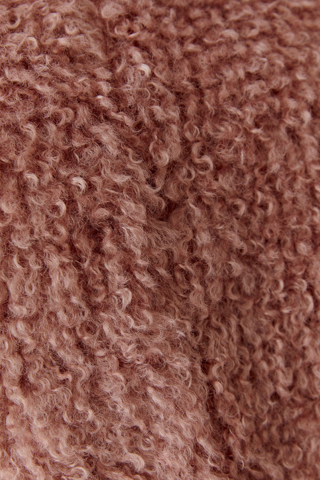 Veste courte sans manches à texture bouclée