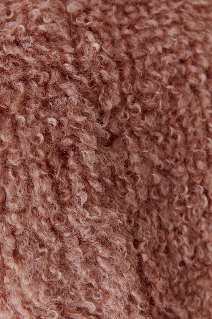 Veste courte sans manches à texture bouclée
