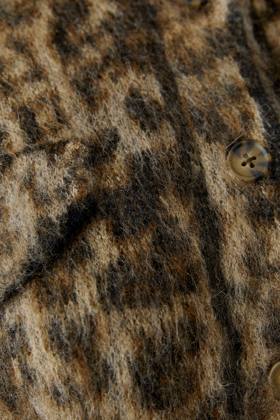 Veste courte en maille à motif léopard