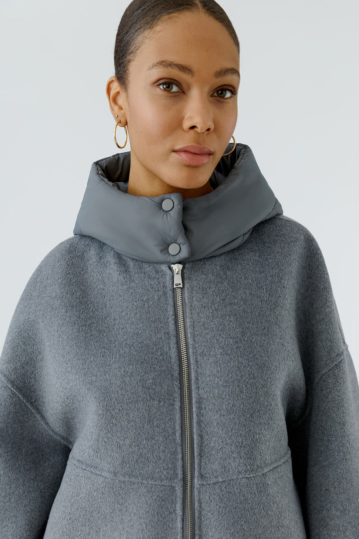 Veste ample à capuchon matelassé