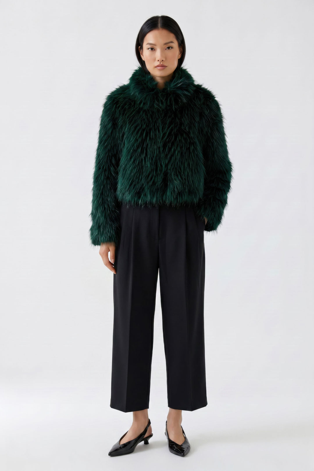 Manteau court à effet fourrure