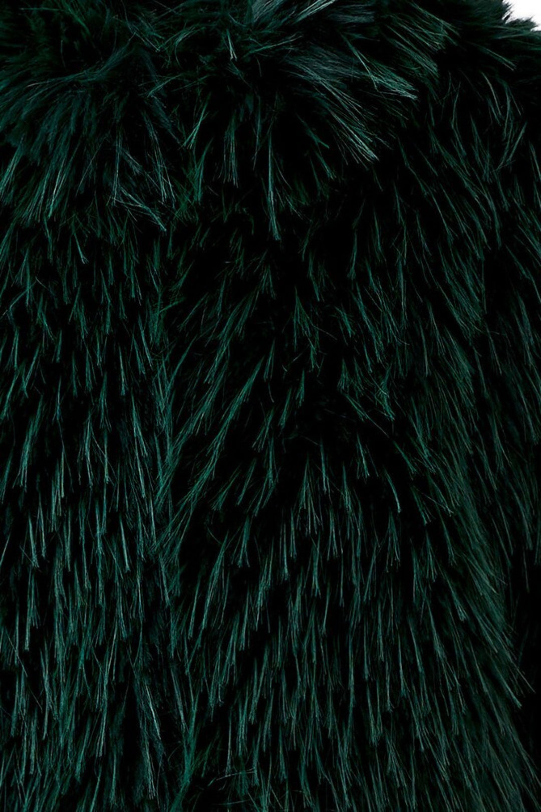 Manteau court à effet fourrure