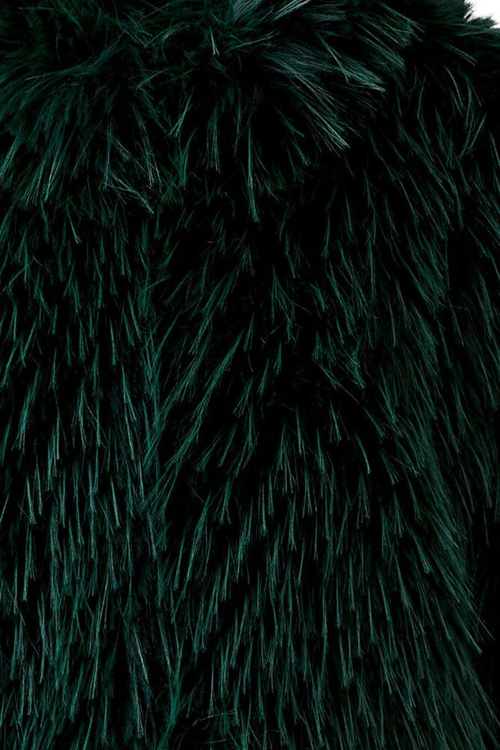 Manteau court à effet fourrure