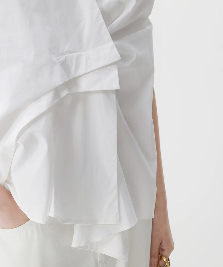 Blouse sans manches à plis asymétriques