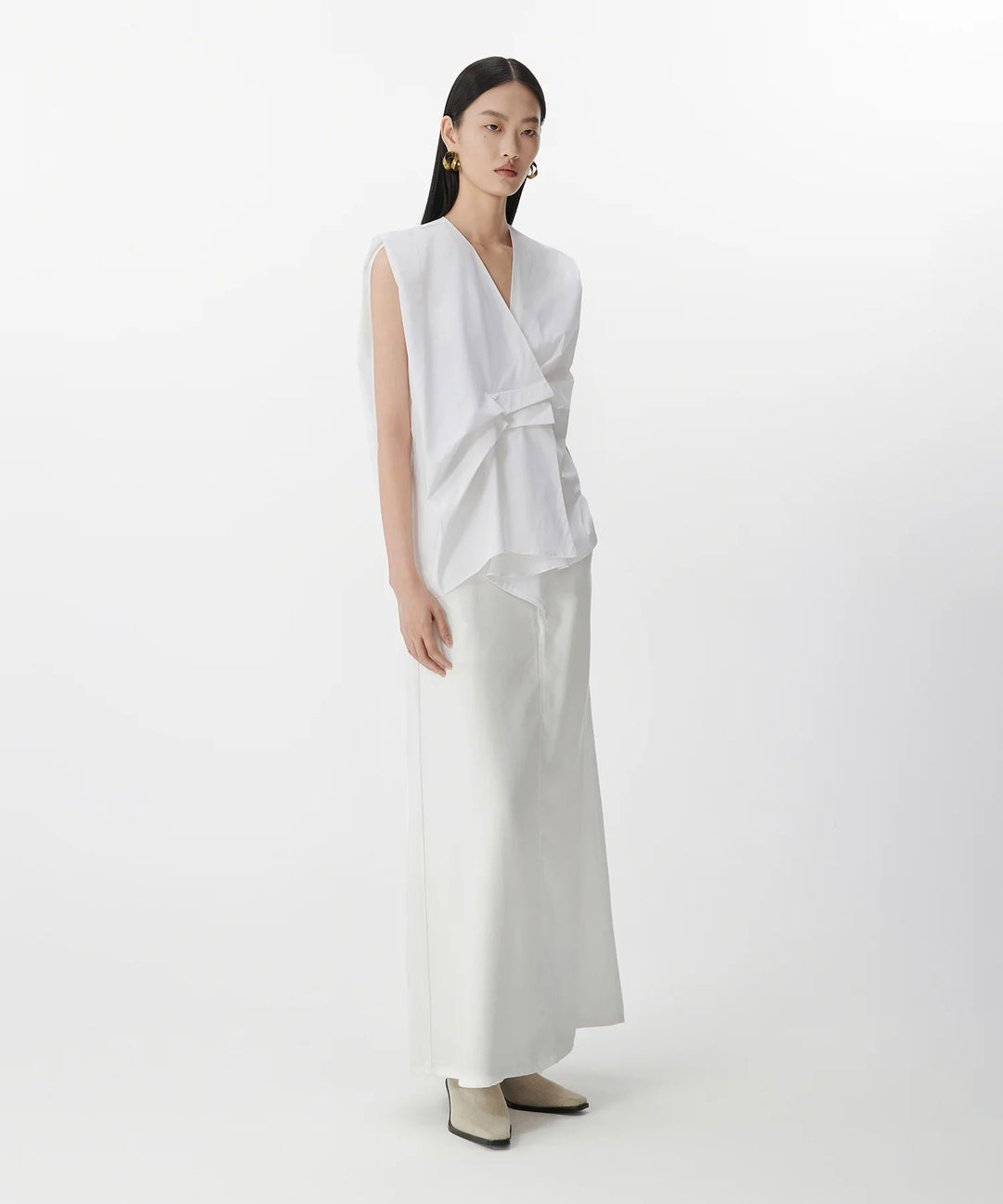 Blouse sans manches à plis asymétriques