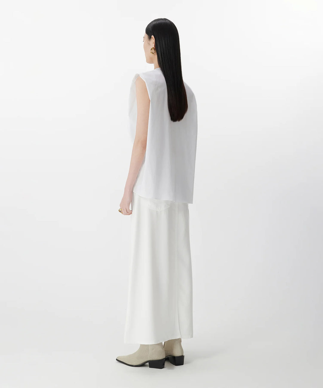 Blouse sans manches à plis asymétriques
