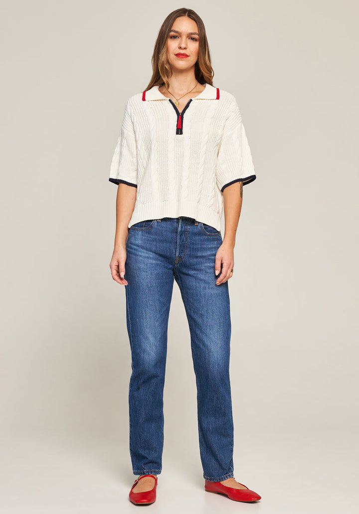 Pull en maille torsadée avec col polo zippé