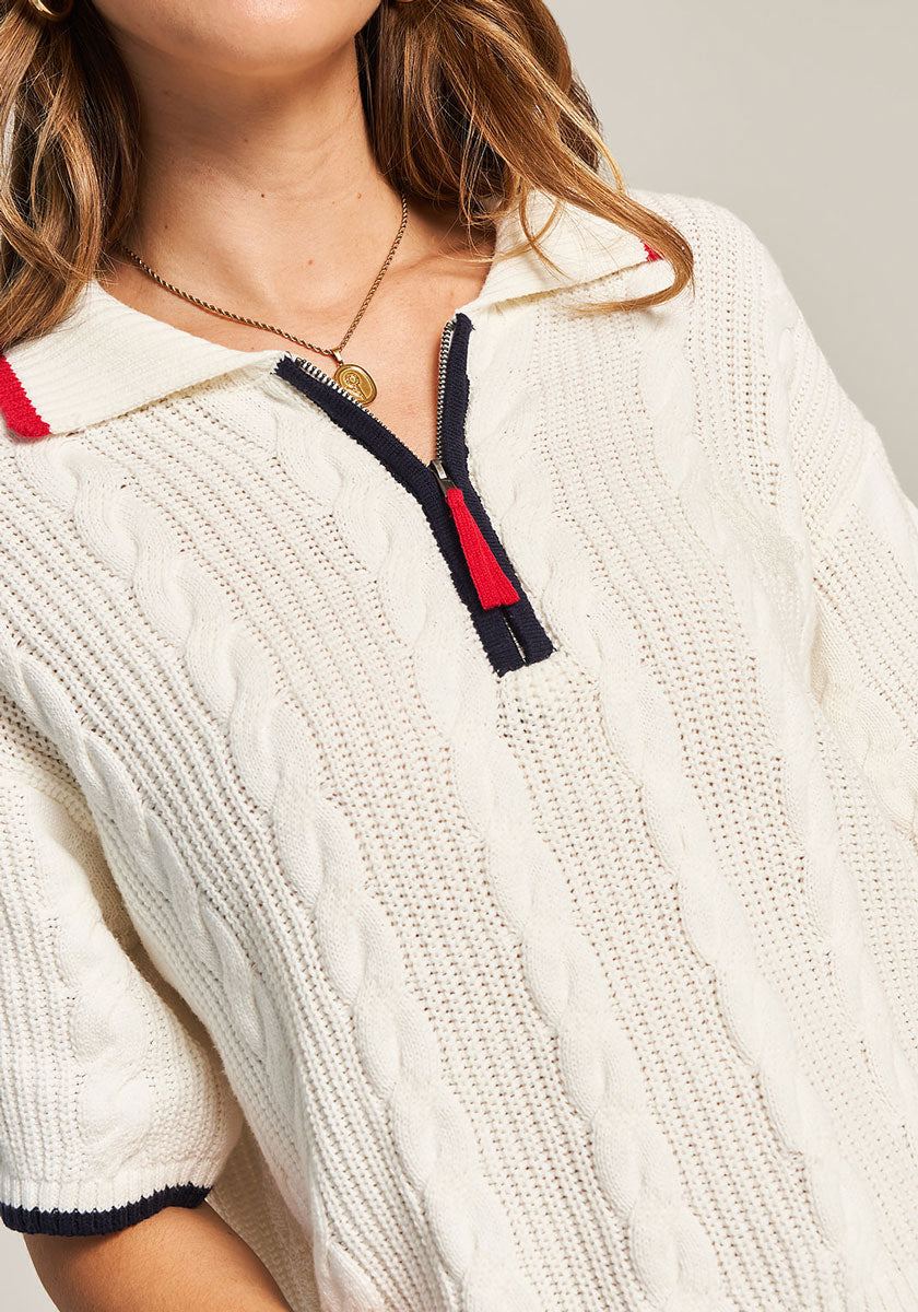Pull en maille torsadée avec col polo zippé