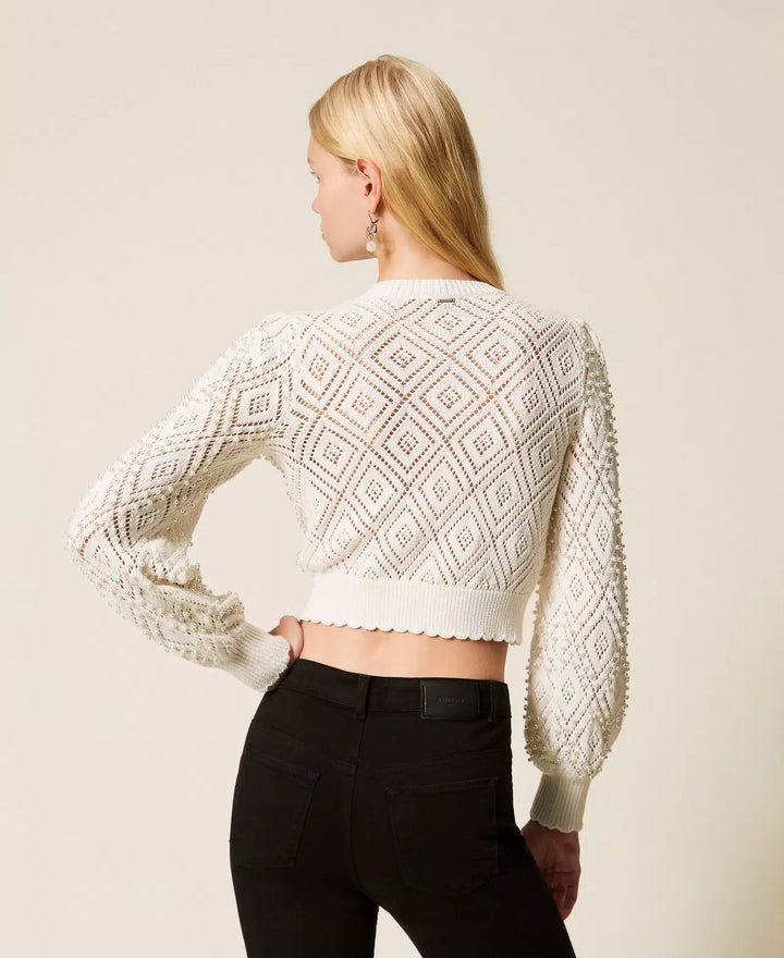 Cardigan à motif losanges et perlé