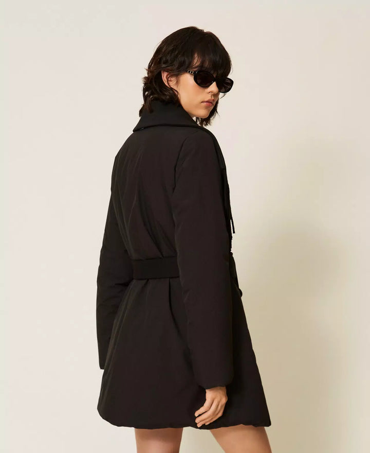 Veste matelassée ceinturée à franges