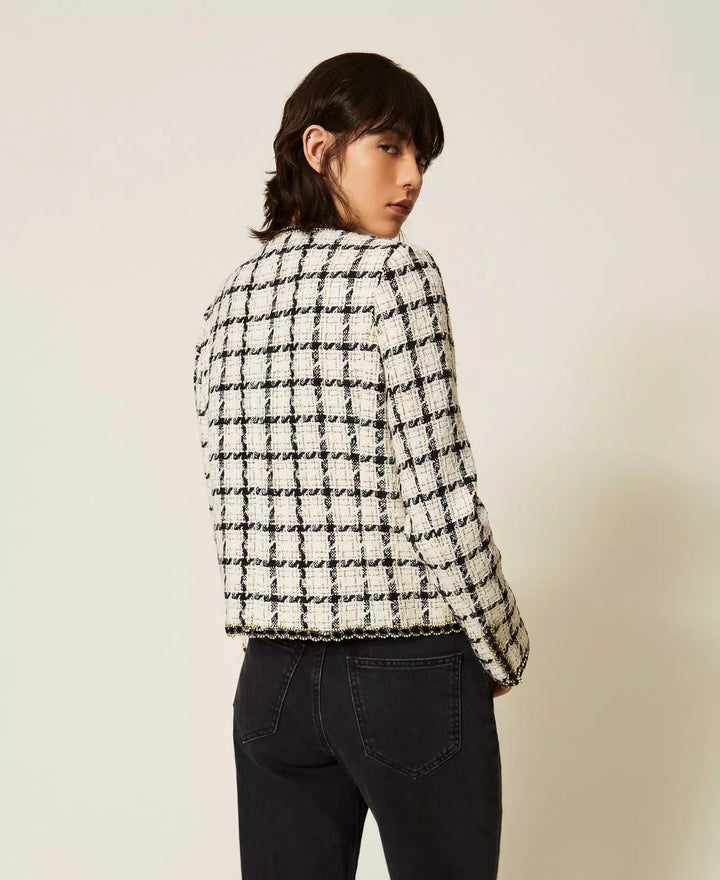 Veste courte à carreaux et finitions contrastantes