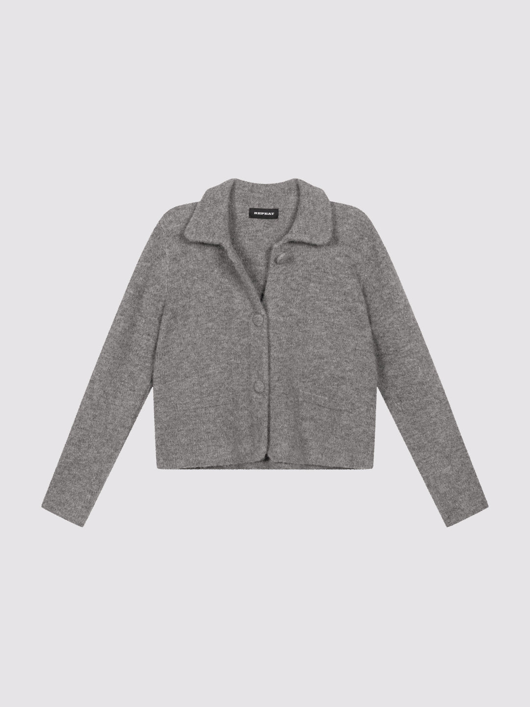 Cardigan en maille bouclée avec col polo