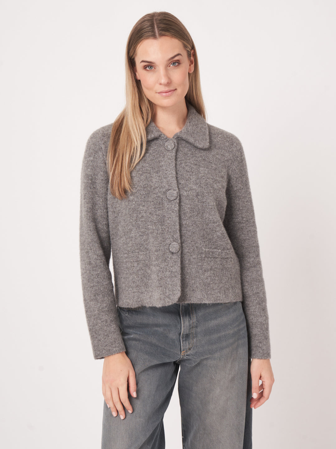 Cardigan en maille bouclée avec col polo