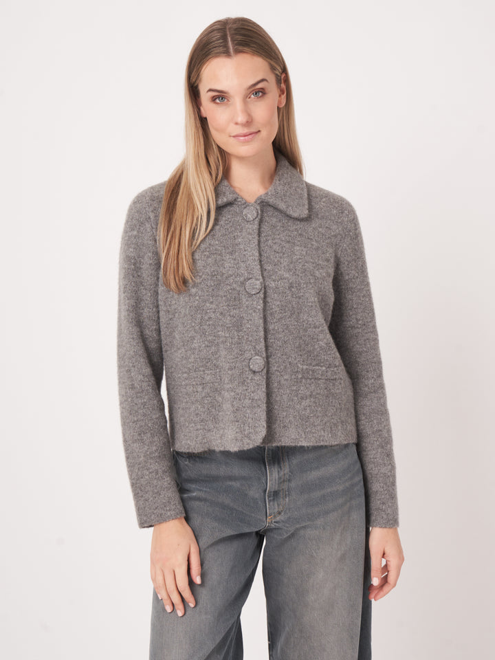 Cardigan en maille bouclée avec col polo