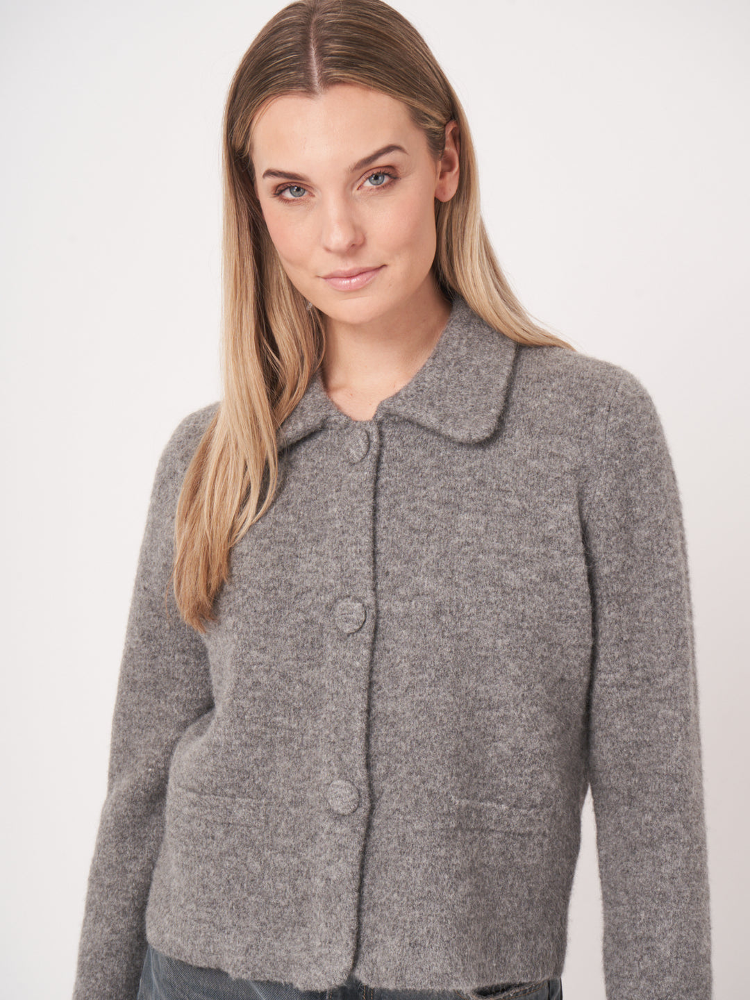Cardigan en maille bouclée avec col polo