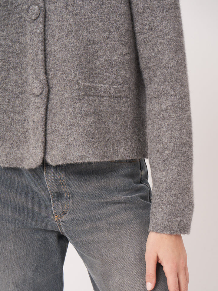 Cardigan en maille bouclée avec col polo