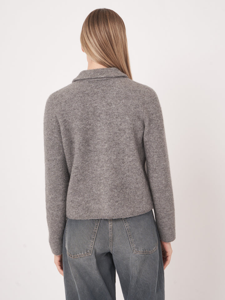Cardigan en maille bouclée avec col polo