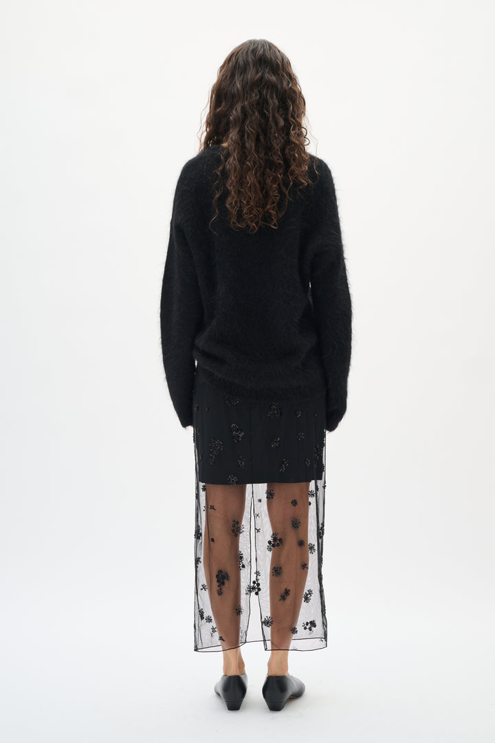 Jupe midi transparente ornée de perles Kui