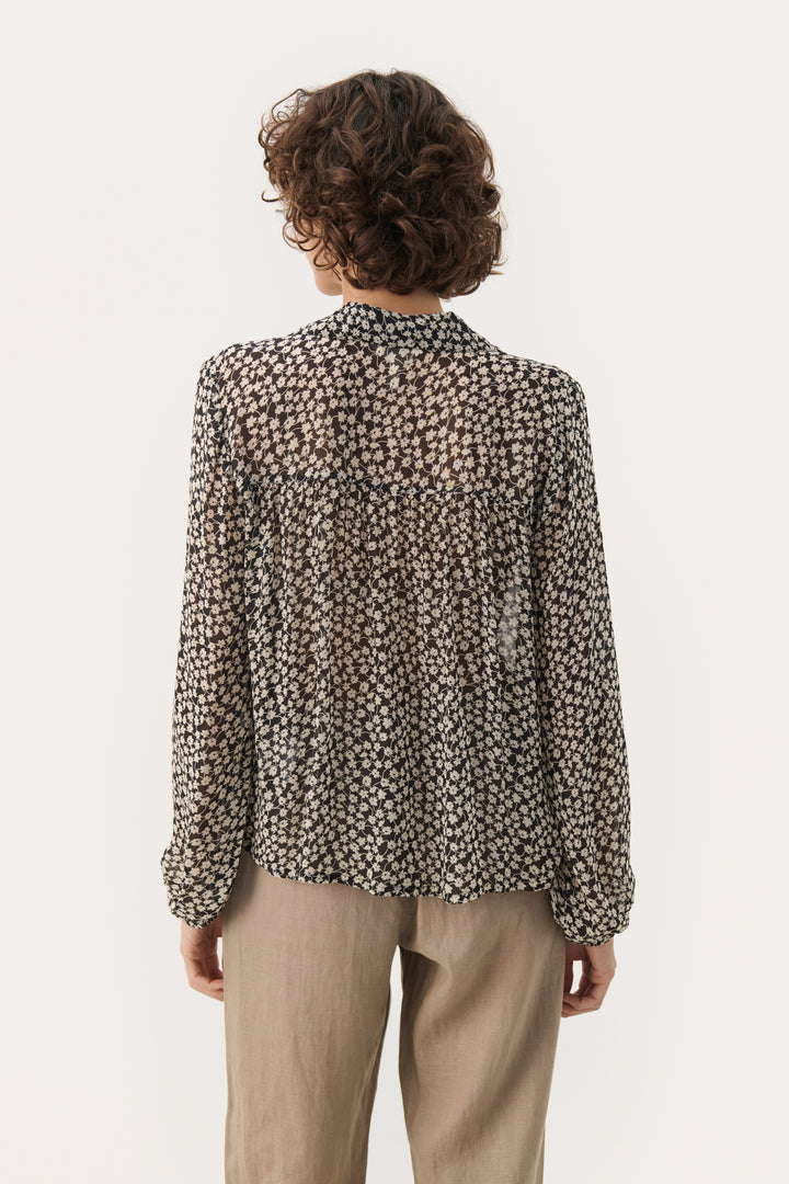 Blouse avec motif floral et col polo ouvert Nicholina