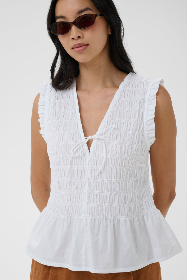 Blouse Borgny smockée à basque et volants