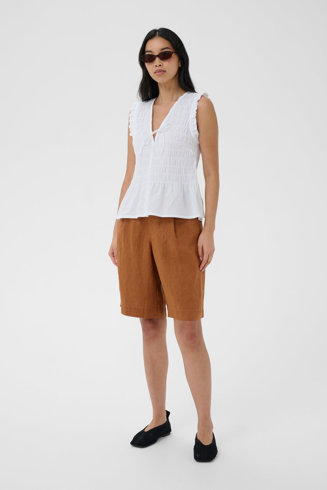 Blouse Borgny smockée à basque et volants