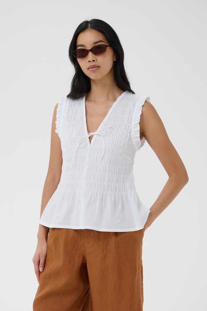 Blouse Borgny smockée à basque et volants