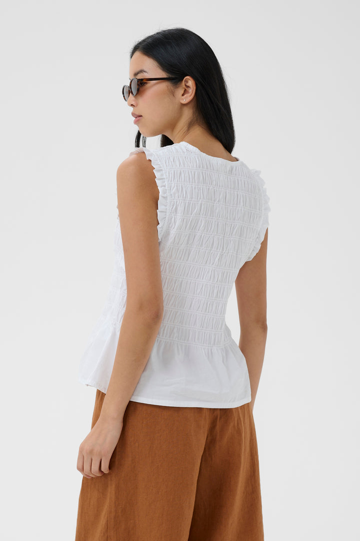 Blouse Borgny smockée à basque et volants