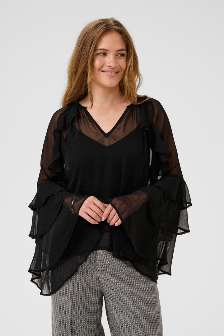 Blouse transparente à volants Lianoa