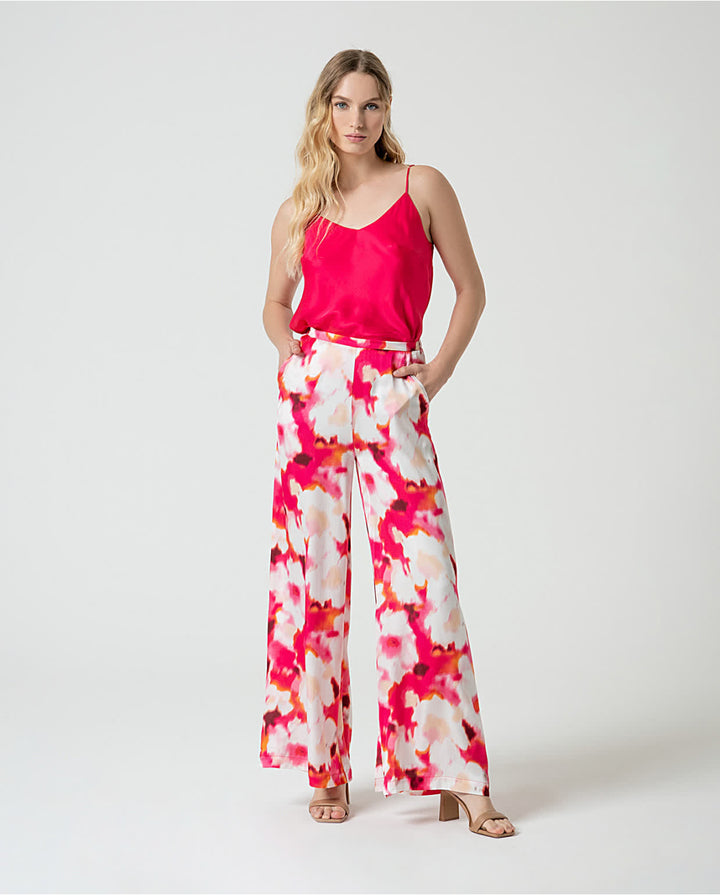 Pantalon palazzo satinée avec imprimé floral abstrait