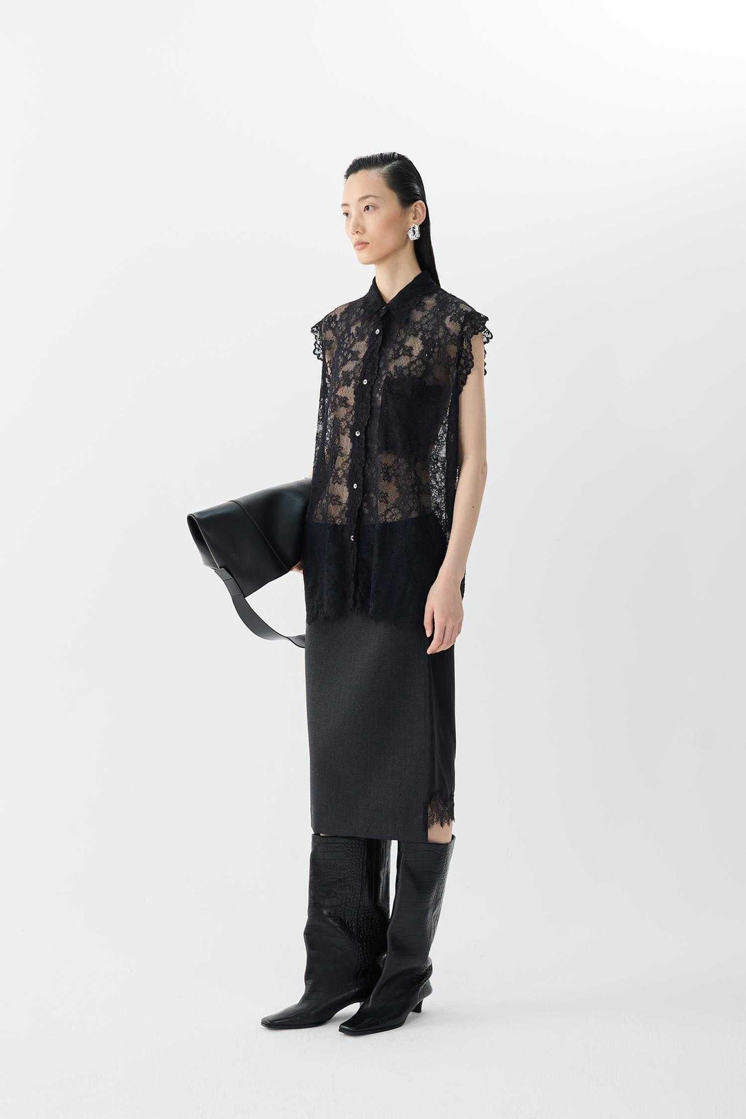 Blouse longue sans manches en dentelle raffinée