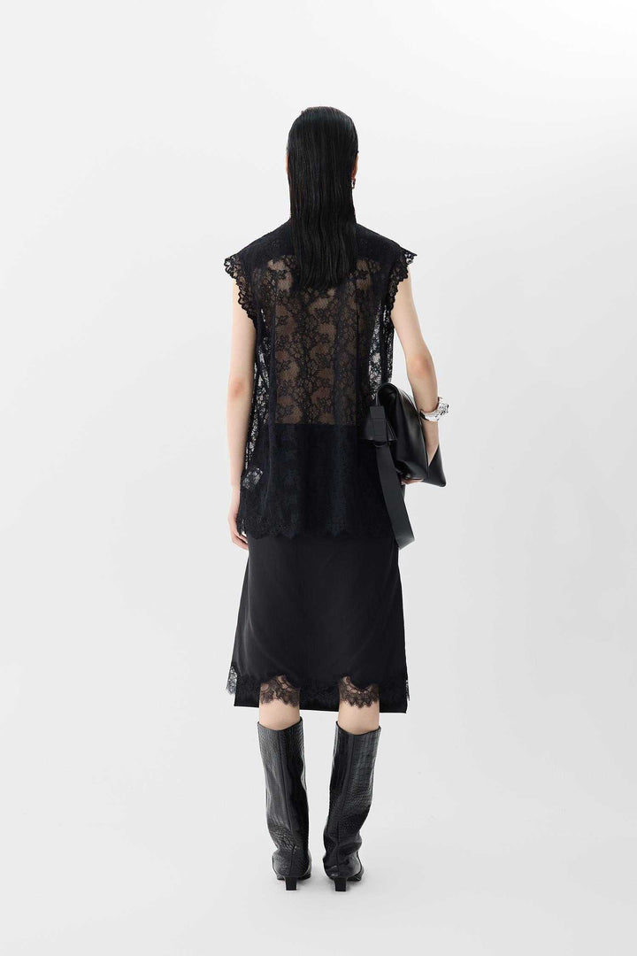 Blouse longue sans manches en dentelle raffinée