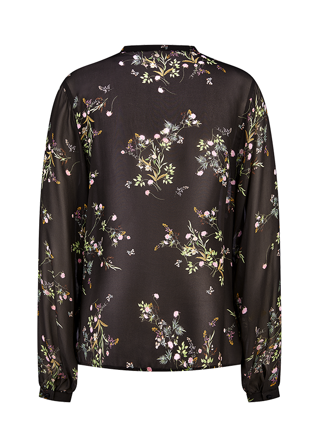 Blouse fleurie vaporeuse à col lacé