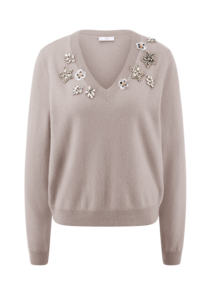 Pull à col V avec détails floraux