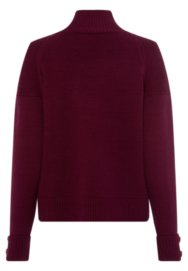 Pull avec boutons aux poignets et col montant