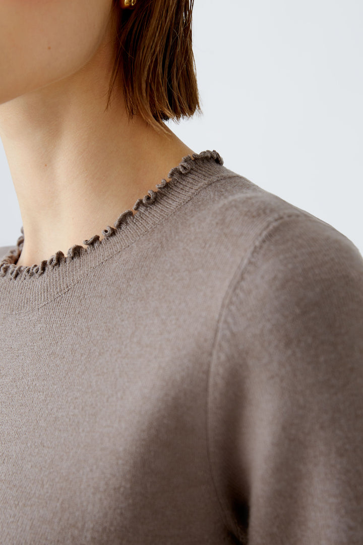 Pull féminin manches courtes à volants