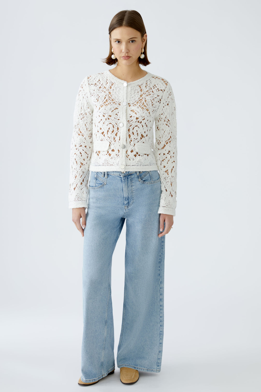 Cardigan ajouré en crochet avec boutons brossés