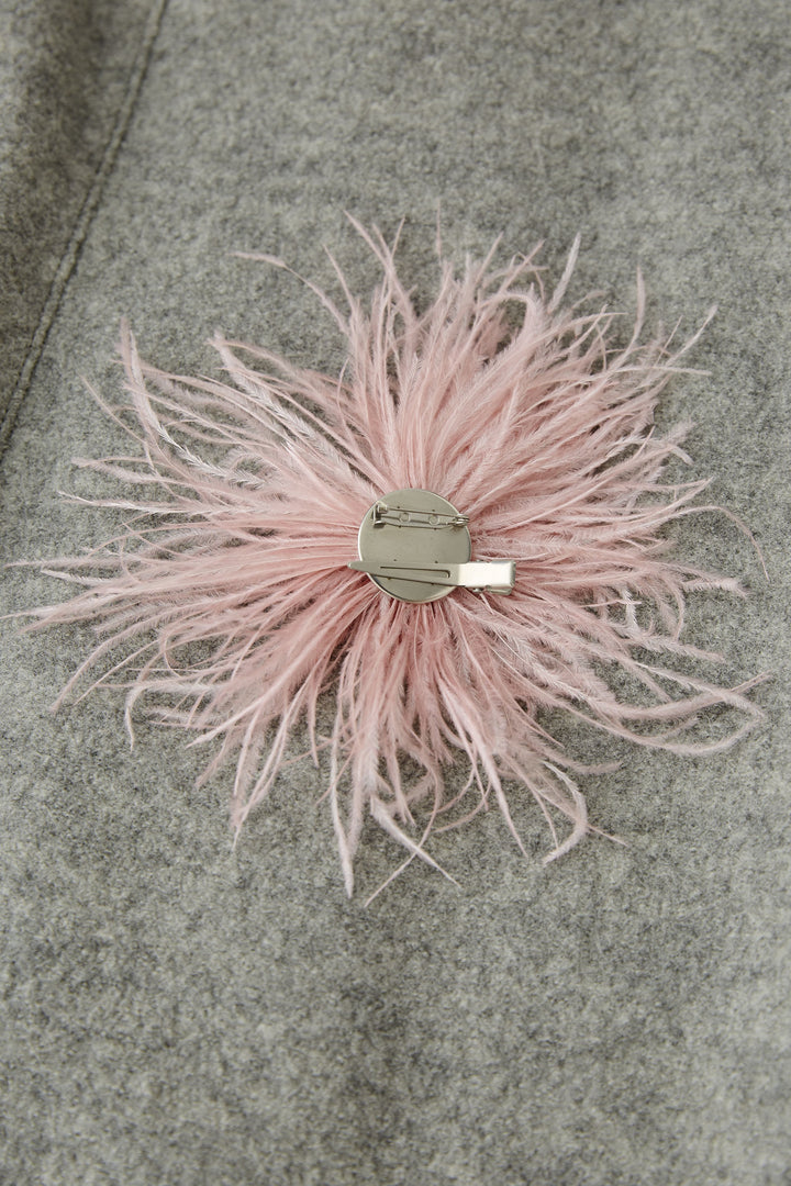 Broche avec plumes véritables