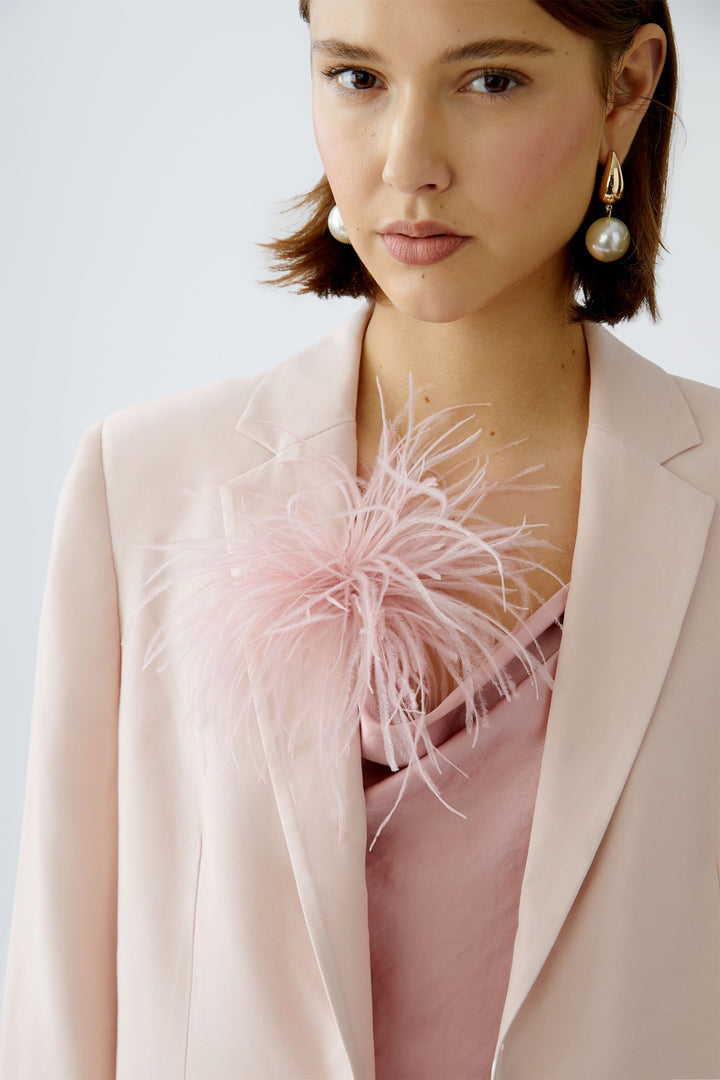 Broche avec plumes véritables