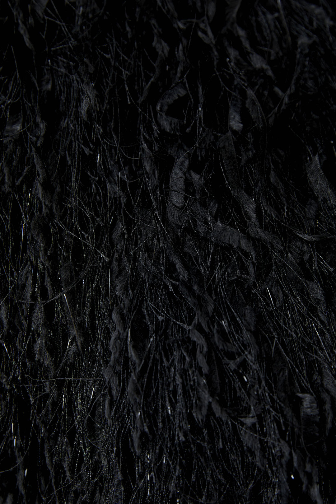 Veste courte frangée de rubans métallisés