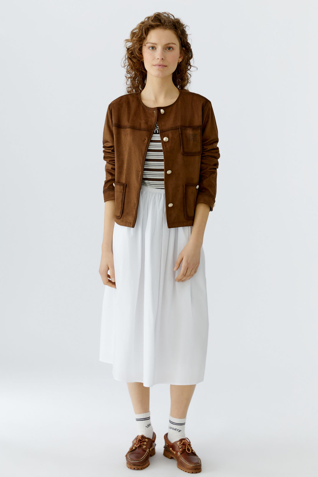 Veste courte structurée à finitions contrastées