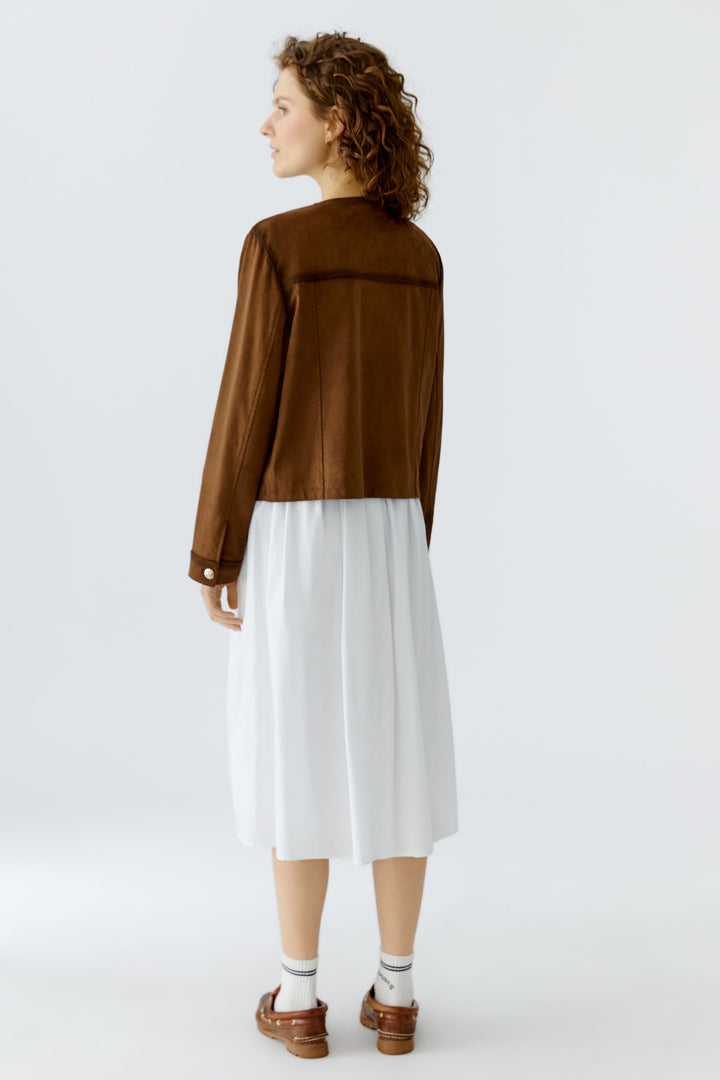 Veste courte structurée à finitions contrastées