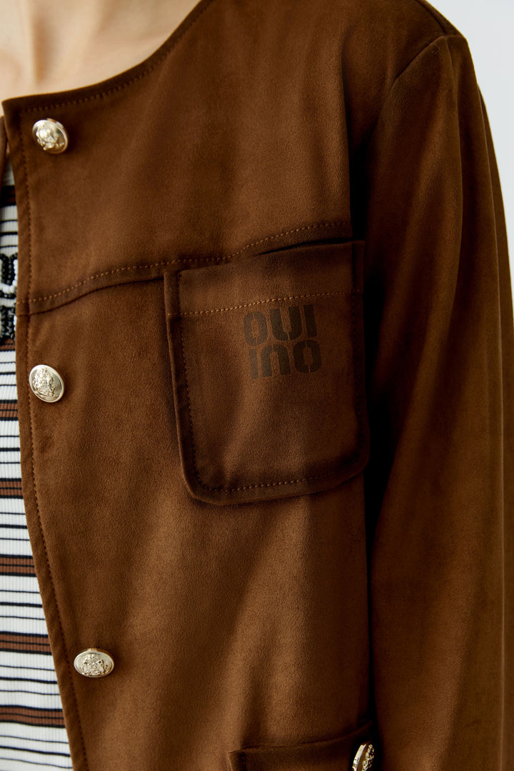 Veste courte structurée à finitions contrastées